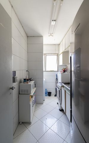 Apartamento à venda com 50m², 2 quartos e 1 vaga Apartamento à venda com 50m², 2 quartos e 1 vagaCozinha e Área de Serviço