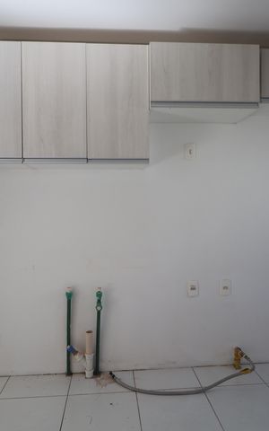 Casa de condomínio para alugar com 100m², 2 quartos e 2 vagasCozinha - Armários