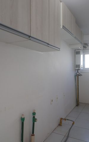 Casa de condomínio para alugar com 100m², 2 quartos e 2 vagasCozinha - Armários