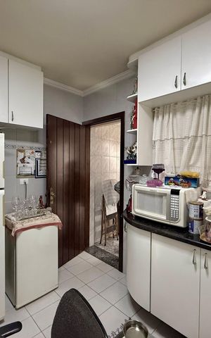 Casa à venda com 110m², 3 quartos e 2 vagas Casa à venda com 110m², 3 quartos e 2 vagasCozinha