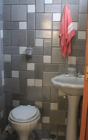 Casa para alugar com 180m², 3 quartos e sem vagaBanheiro da Suíte 1