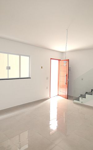 Casa de condomínio à venda com 85m², 2 quartos e 1 vagaSala / Cozinha