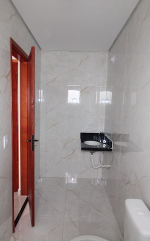 Casa de condomínio à venda com 85m², 2 quartos e 1 vagaBanheiro 2