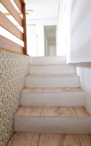 Casa para alugar com 75m², 2 quartos e 1 vagaEscada Entrada