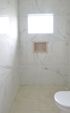 Casa à venda com 127m², 3 quartos e 2 vagasBanheiro 1