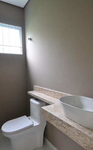 Casa à venda com 127m², 3 quartos e 2 vagasLavabo