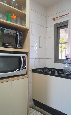 Casa à venda com 55m², 2 quartos e 2 vagasCozinha