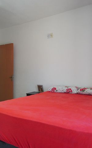 Casa à venda com 55m², 2 quartos e 2 vagasQuarto 1