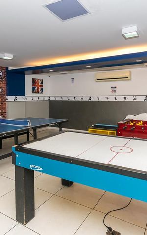 Apartamento à venda com 56m², 2 quartos e 1 vaga Apartamento à venda com 56m², 2 quartos e 1 vagaÁrea comum - Sala de jogos
