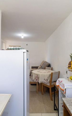 Apartamento à venda com 48m², 2 quartos e 1 vaga Apartamento à venda com 48m², 2 quartos e 1 vagaCozinha e Área de Serviço