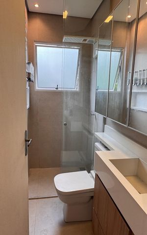 Casa de condomínio para alugar com 75m², 2 quartos e 1 vagaBanheiro da Suíte