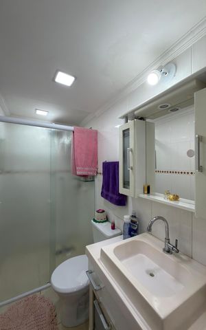 Apartamento à venda com 52m², 2 quartos e 1 vaga Apartamento à venda com 52m², 2 quartos e 1 vagaBanheiro Social