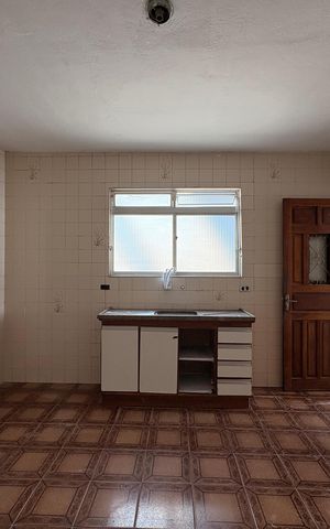 Casa à venda com 86m², 2 quartos e 2 vagas Casa à venda com 86m², 2 quartos e 2 vagasCozinha