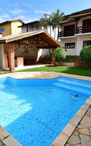 Casa de condomínio à venda com 240m², 4 quartos e 2 vagasÁrea comum - Piscina
