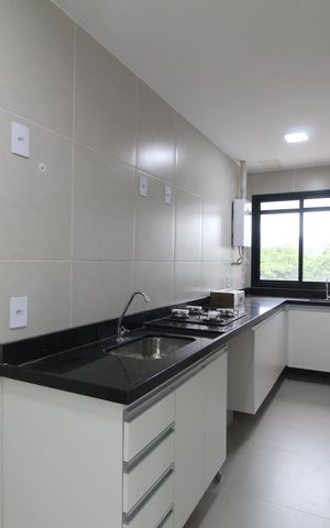 Apartamento à venda com 59m², 2 quartos e 1 vagaCozinha e Área de Serviço