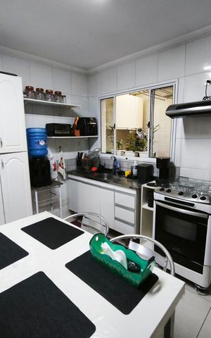 Casa de condomínio à venda com 100m², 3 quartos e 2 vagas Casa de condomínio à venda com 100m², 3 quartos e 2 vagasCozinha