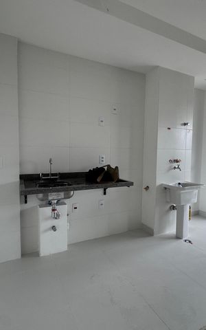 Apartamento à venda com 75m², 2 quartos e 2 vagas Apartamento à venda com 75m², 2 quartos e 2 vagasCozinha e Área de Serviço