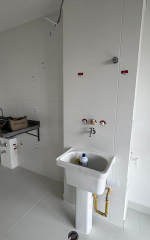 Apartamento à venda com 75m², 2 quartos e 2 vagas Apartamento à venda com 75m², 2 quartos e 2 vagasCozinha e Área de Serviço