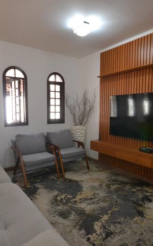 Casa à venda com 217m², 3 quartos e 2 vagasSala