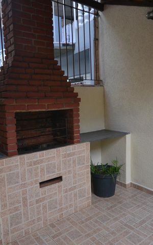 Casa à venda com 217m², 3 quartos e 2 vagasQuintal/Churrasqueira