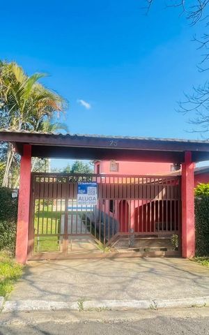 Casa de condomínio para alugar com 450m², 3 quartos e 6 vagas Casa de condomínio para alugar com 450m², 3 quartos e 6 vagasFachada com placa