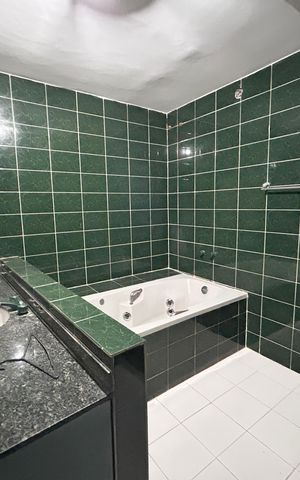 Casa à venda com 405m², 5 quartos e 4 vagasBanheiro do Quarto 5 - Suíte