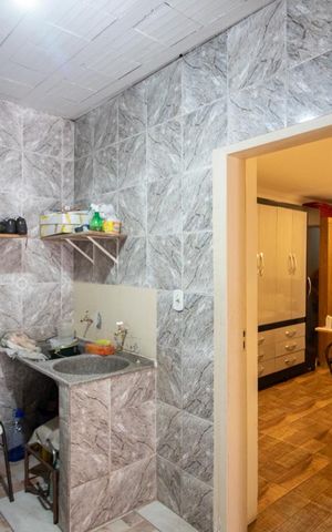 Casa à venda com 130m², 5 quartos e 3 vagasCasa 1 - Área de Serviço