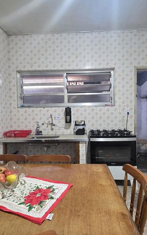 Casa à venda com 150m², 3 quartos e 3 vagas Casa à venda com 150m², 3 quartos e 3 vagasCozinha