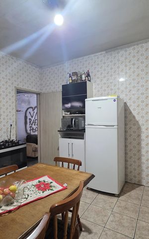 Casa à venda com 150m², 3 quartos e 3 vagas Casa à venda com 150m², 3 quartos e 3 vagasCozinha