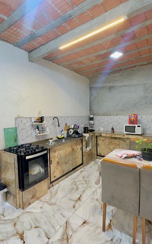 Casa à venda com 50m², 3 quartos e sem vaga Casa à venda com 50m², 3 quartos e sem vagaCozinha