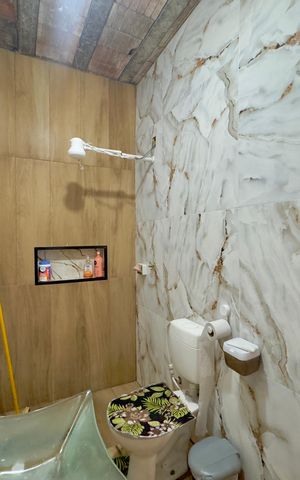 Casa à venda com 50m², 3 quartos e sem vaga Casa à venda com 50m², 3 quartos e sem vagaBanheiro 1
