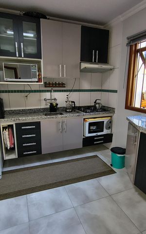 Casa à venda com 115m², 3 quartos e 1 vaga Casa à venda com 115m², 3 quartos e 1 vagaCozinha