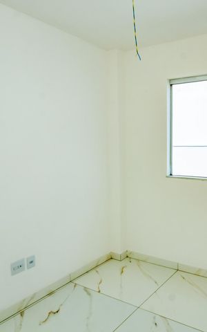 Casa à venda com 80m², 2 quartos e 2 vagasQuarto2