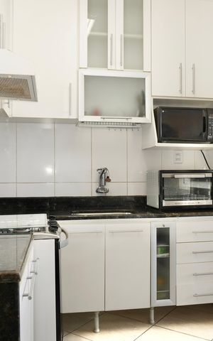 Apartamento à venda com 80m², 3 quartos e 1 vaga Apartamento à venda com 80m², 3 quartos e 1 vagaCozinha e Área de Serviço