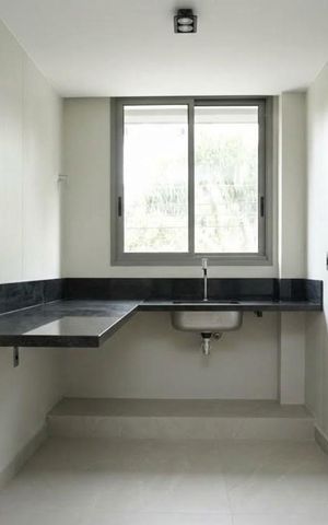 Apartamento à venda com 64m², 1 quarto e 1 vaga Apartamento à venda com 64m², 1 quarto e 1 vagaCozinha e Área de Serviço