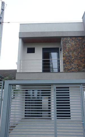Casa à venda com 117m², 3 quartos e 2 vagasFachada