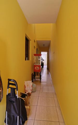 Casa à venda com 160m², 3 quartos e 2 vagasCorredor