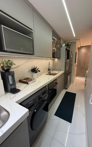 Apartamento à venda com 56m², 2 quartos e 1 vaga Apartamento à venda com 56m², 2 quartos e 1 vagaCozinha