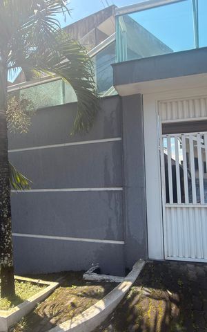 Casa para alugar com 56m², 2 quartos e 1 vaga Casa para alugar com 56m², 2 quartos e 1 vagaFachada