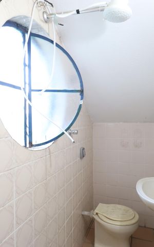 Casa à venda com 450m², 4 quartos e 3 vagasBanheiro da Suíte 2