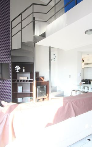Studio à venda com 55m², 1 quarto e 2 vagasSala
