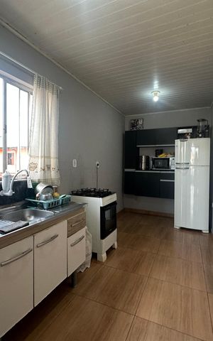 Casa à venda com 250m², 3 quartos e 1 vaga Casa à venda com 250m², 3 quartos e 1 vagaCozinha