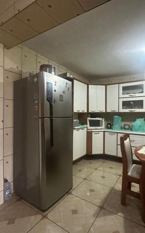 Casa à venda com 250m², 3 quartos e 1 vaga Casa à venda com 250m², 3 quartos e 1 vagaCozinha
