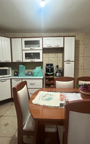 Casa à venda com 250m², 3 quartos e 1 vaga Casa à venda com 250m², 3 quartos e 1 vagaCozinha