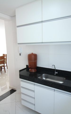 Apartamento à venda com 58m², 2 quartos e 1 vagaCozinha e Área de Serviço