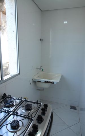 Apartamento à venda com 58m², 2 quartos e 1 vagaCozinha e Área de Serviço