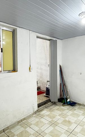 Casa à venda com 36m², 2 quartos e 1 vaga Casa à venda com 36m², 2 quartos e 1 vagaQuarto da Garagem