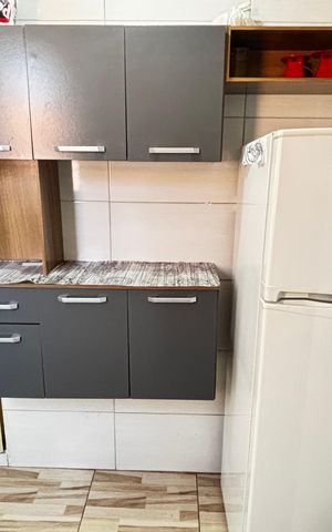 Casa à venda com 36m², 2 quartos e 1 vaga Casa à venda com 36m², 2 quartos e 1 vagaCozinha