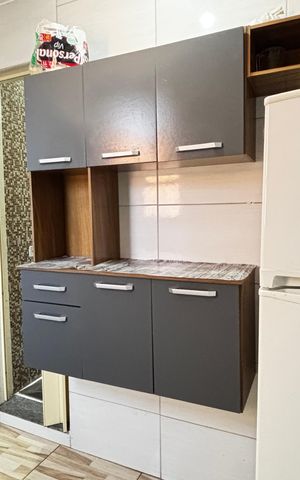 Casa à venda com 36m², 2 quartos e 1 vaga Casa à venda com 36m², 2 quartos e 1 vagaCozinha