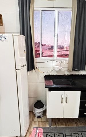 Casa à venda com 36m², 2 quartos e 1 vaga Casa à venda com 36m², 2 quartos e 1 vagaCozinha